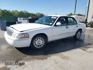2003 Mercury Grand Marquis GS Convenience z VIN 2MEFM74W13X607924, wystawiony jako Copart lot #48960815 z przebiegiem 141 975 mil mil oraz Szkody całkowita. Historia ofert i sprzedaży dostępna na DreamBid. Obrazek 1.