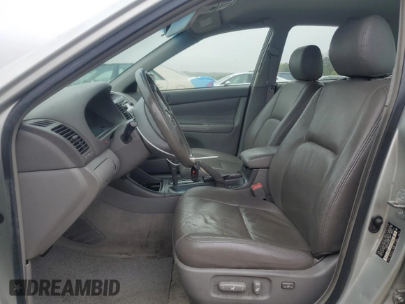2004 Toyota Camry LE with VIN JTDBE32K840266737, listed as a Copart auction lot 58187325 with 172,013 mi miles and Clean title. Bid and sale history available at DreamBid. Image 7.
