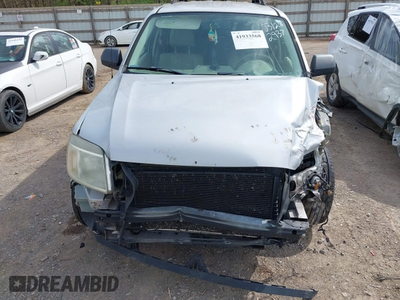 2008 Mercury Mariner with VIN 4M2CU29H38KJ29379, listed as a IAAI auction lot 41933568 with Not provided miles and . Bid and sale history available at DreamBid. Image 6.