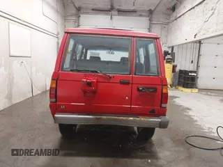 1991 Isuzu Trooper z VIN JACCH58R6M8905869, wystawiony jako IAAI lot #42394651 z przebiegiem 117 130 mil mil oraz . Historia ofert i sprzedaży dostępna na DreamBid. Obrazek 16.