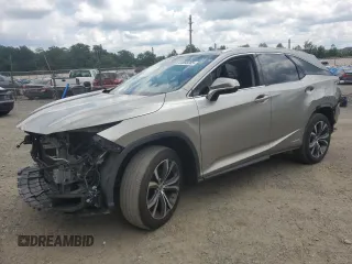 2018 Lexus RX 450hL Premium with VIN JTJDGKCA8J2004443, listed as a Copart auction lot 64588205 with 75,646 mi miles and Salvage title. Bid and sale history available at DreamBid. Image 1.