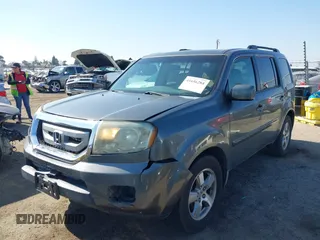 2009 Honda Pilot EX with VIN 5FNYF48439B036957, listed as a IAAI auction lot 41656284 with 199,115 mi miles. Bid and sale history available at carsss.com. Image 20.