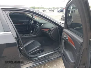 2014 Cadillac CTS Luxury AWD with VIN 1G6AX5SX9E0197395, listed as a IAAI auction lot 42211452 with 90,657 mi miles and . Bid and sale history available at DreamBid. Image 5.