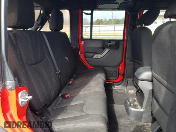 2015 Jeep Wrangler Unlimited Willys Wheeler with VIN 1C4BJWDG2FL542045, listed as a Copart auction lot 52903465 with 86,205 mi miles and Clean Title. Bid and sale history available at DreamBid. Image 10.