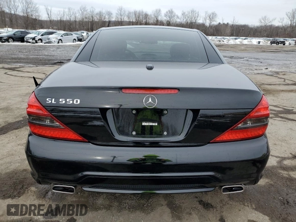 2009 Mercedes-Benz SL 550 with VIN WDBSK71F29F152210, listed as a Copart auction lot 44854165 with 69,777 mi miles and Salvage title. Bid and sale history available at DreamBid. Image 6.