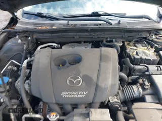 2017 Mazda 3 Touring z VIN 3MZBN1V74HM128575, wystawiony jako IAAI lot #42731487 z przebiegiem 136 553 mil mil oraz . Historia ofert i sprzedaży dostępna na DreamBid. Obrazek 10.