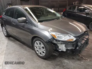 2012 Ford Focus SE with VIN 1FAHP3K22CL394088, listed as a IAAI auction lot 40953085 with 147,259 mi miles and . Bid and sale history available at carsss.com. Image 1.