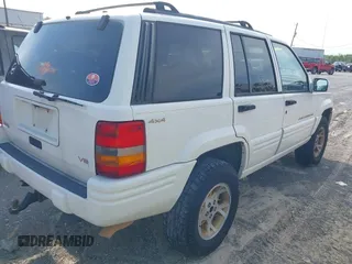 1998 Jeep Grand Cherokee Limited z VIN 1J4GZ78Y9WC342250, wystawiony jako IAAI lot #42047991 z przebiegiem 271 579 mil mil oraz . Historia ofert i sprzedaży dostępna na DreamBid. Obrazek 4.
