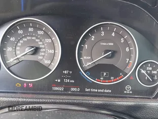 2013 BMW 3 Series 328i xDrive with VIN WBA3B3G56DNR81144, listed as a IAAI auction lot 40620694 with 159,022 mi miles. Bid and sale history available at carsss.com. Image 7.