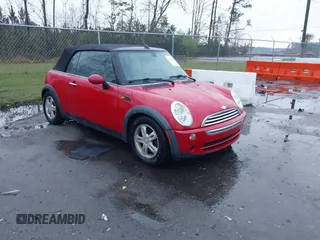 2006 MINI Convertible with VIN WMWRF33526TF64836, listed as a IAAI auction lot 41766880 with 207,094 mi miles and . Bid and sale history available at DreamBid. Image 1.
