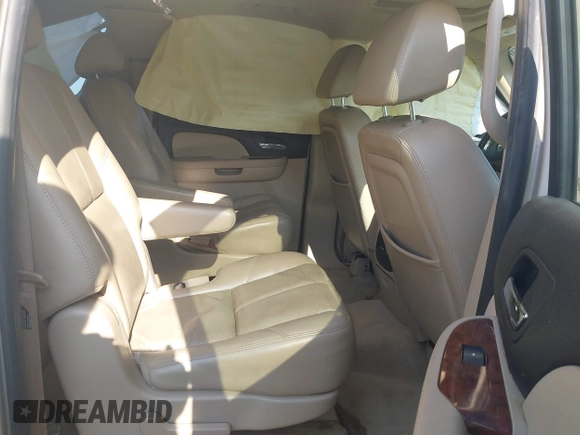 2007 Chevrolet Suburban LS with VIN 1GNFC16007J203853, listed as a IAAI auction lot 39454050 with 246,521 mi miles and . Bid and sale history available at DreamBid. Image 8.