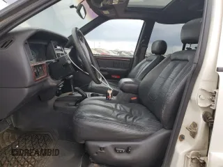 1998 Jeep Grand Cherokee Limited with VIN 1J4GZ88Z4WC164505, listed as a Copart auction lot 76843304 with 0 mi miles and Salvage Title. Bid and sale history available at carsss.com. Image 7.