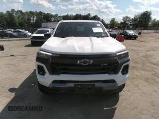 2023 Chevrolet Colorado 4WD Z71 with VIN 1GCPTDEK4P1249624, listed as a IAAI auction lot 42130950 with 9,795 mi miles and . Bid and sale history available at DreamBid. Image 12.