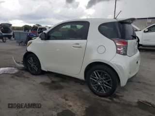 2013 Scion iQ with VIN JTNJJXB01DJ022687, listed as a Copart auction lot 61918195 with 117,483 mi miles and Salvage title. Bid and sale history available at DreamBid. Image 2.