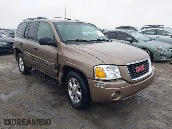 2003 GMC Envoy SLE with VIN 1GKDT13S332264984, listed as a IAAI auction lot 41523191 with 227,004 mi miles. Bid and sale history available at carsss.com. Image 1.