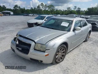 2006 Chrysler 300 Touring z VIN 2C3KA53G86H109231, wystawiony jako IAAI lot #42299031 z przebiegiem Nie podano mil oraz . Historia ofert i sprzedaży dostępna na DreamBid. Obrazek 16.