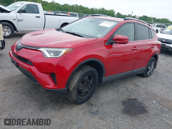 2017 Toyota RAV4 LE with VIN JTMBFREV8HJ161427, listed as a IAAI auction lot 42333851 with 121,161 mi miles and . Bid and sale history available at DreamBid. Image 2.