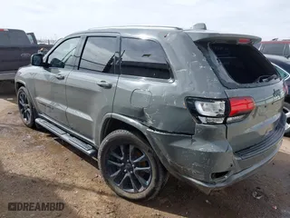 2021 Jeep Grand Cherokee Laredo X with VIN 1C4RJEAG5MC824738, listed as a IAAI auction lot 41580995 with 57,923 mi miles. Bid and sale history available at carsss.com. Image 3.