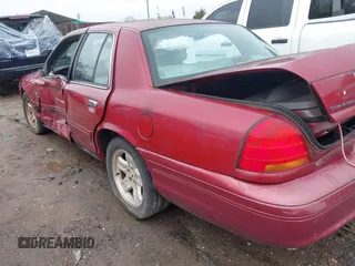 2002 Ford Crown Victoria LX z VIN 2FAFP74W82X148324, wystawiony jako IAAI lot #41565717 z przebiegiem 114 536 mil mil oraz . Historia ofert i sprzedaży dostępna na DreamBid. Obrazek 3.