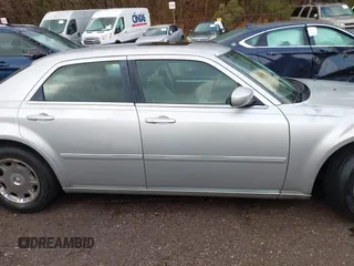 2006 Chrysler 300 Touring with VIN 2C3KA53G66H532518, listed as a IAAI auction lot 41356230 with 203,605 mi miles. Bid and sale history available at carsss.com. Image 12.