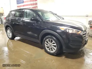 2018 Hyundai Tucson SE with VIN KM8J23A4XJU706089, listed as a Copart auction lot 48947104 with 61,074 mi miles and Salvage Title. Bid and sale history available at carsss.com. Image 4.
