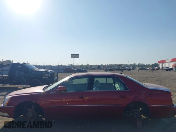 2008 Cadillac DTS 1SC with VIN 1G6KD57Y08U143396, listed as a IAAI auction lot 40618555 with 124,706 mi miles and . Bid and sale history available at carsss.com. Image 12.