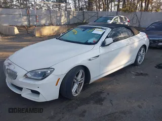 2012 BMW 6 Series 650i with VIN WBALZ3C51CDL73084, listed as a IAAI auction lot 41656473 with 61,152 mi miles and . Bid and sale history available at carsss.com. Image 2.