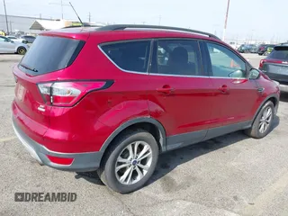 2017 Ford Escape SE with VIN 1FMCU0GD4HUC27041, listed as a IAAI auction lot 42127328 with 107,860 mi miles. Bid and sale history available at carsss.com. Image 4.