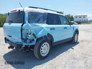 2024 Ford Bronco Sport Heritage с VIN 3FMCR9G65RRF35612, выставлен на аукционе IAAI как лот 42307634 с пробегом 2 133 миль миль и . История ставок и продаж доступна на DreamBid. Изображение 4.