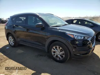 2019 Hyundai Tucson Value with VIN KM8J33A43KU888877, listed as a Copart auction lot 52191305 with 77,204 mi miles and Salvage title. Bid and sale history available at DreamBid. Image 4.