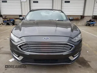 2018 Ford Fusion SE z VIN 3FA6P0HD8JR245391, wystawiony jako Copart lot #53571445 z przebiegiem 158 138 mil mil oraz Czysty tytuł • Clean title. Historia ofert i sprzedaży dostępna na DreamBid. Obrazek 5.