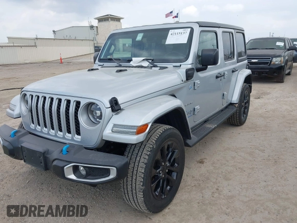 2023 Jeep Wrangler Sahara with VIN 1C4JJXP62PW627455, listed as a IAAI auction lot 42115137 with 62,143 mi miles and . Bid and sale history available at DreamBid. Image 17.