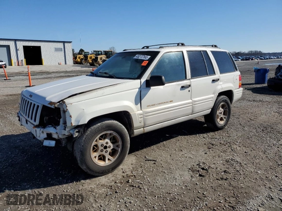 1998 Jeep Grand Cherokee Limited with VIN 1J4GZ78Y0WC307578, listed as a Copart auction lot 45272765 with 328,264 mi miles and Salvage title. Bid and sale history available at DreamBid. Image 1.