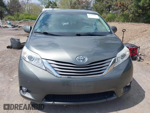 2012 Toyota Sienna XLE AAS z VIN 5TDYK3DC0CS221618, wystawiony jako IAAI lot #41983806 z przebiegiem 200 851 mil mil oraz . Historia ofert i sprzedaży dostępna na DreamBid. Obrazek 13.