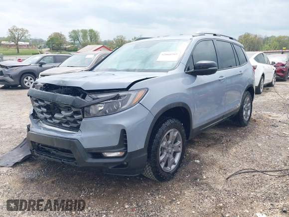 2025 Honda Passport TrailSport z VIN 5FNYF8H69SB012063, wystawiony jako IAAI lot #42060797 z przebiegiem 6078 mil mil oraz . Historia ofert i sprzedaży dostępna na DreamBid. Obrazek 17.