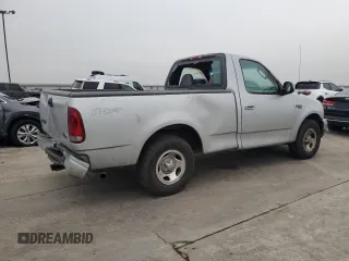 2002 Ford F-150 XL with VIN 1FTRF172X2NB77521, listed as a Copart auction lot 43993885 with 339,289 mi miles and Salvage Title. Bid and sale history available at carsss.com. Image 3.