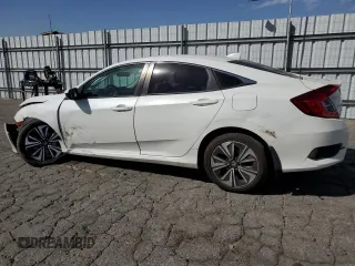 2016 Honda Civic Sedan EX-T with VIN 2HGFC1F34GH640292, listed as a Copart auction lot 47135365 with 101,728 mi miles and Salvage Title. Bid and sale history available at carsss.com. Image 2.