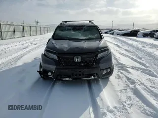 2021 Honda Passport Elite z VIN 5FNYF8H05MB021597, wystawiony jako Copart lot #44463515 z przebiegiem Nie podano mil oraz Szkoda całkowita • Salvage title. Historia ofert i sprzedaży dostępna na DreamBid. Obrazek 12.