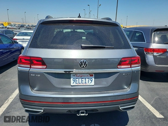 2023 Volkswagen Atlas SE z VIN 1V2HR2CA5PC526012, wystawiony jako IAAI lot #42796408 z przebiegiem 41 216 mil mil oraz . Historia ofert i sprzedaży dostępna na DreamBid. Obrazek 27.