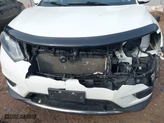 2016 Nissan Rogue S with VIN KNMAT2MV1GP669392, listed as a IAAI auction lot 41698418 with 165,288 mi miles. Bid and sale history available at carsss.com. Image 6.