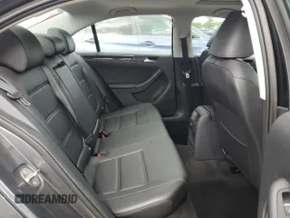 2017 Volkswagen Jetta SEL z VIN 3VWL17AJ6HM392174, wystawiony jako Copart lot #57771225 z przebiegiem 31 148 mil mil oraz Szkoda całkowita • Salvage title. Historia ofert i sprzedaży dostępna na DreamBid. Obrazek 10.