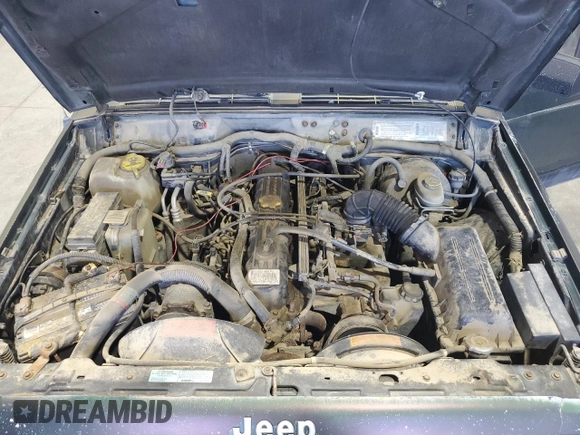 1996 Jeep Cherokee Sport with VIN 1J4FJ68S8TL282160, listed as a Copart auction lot 70670014 with 217,003 mi miles and Clean Title. Bid and sale history available at carsss.com. Image 11.
