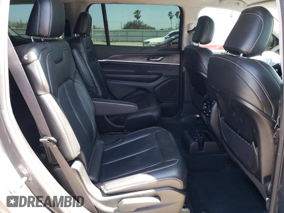 2023 Jeep Grand Cherokee Limited z VIN 1C4RJJBG8P8101321, wystawiony jako Copart lot #48723865 z przebiegiem 33 062 mil mil oraz Szkoda całkowita • Salvage title. Historia ofert i sprzedaży dostępna na DreamBid. Obrazek 11.