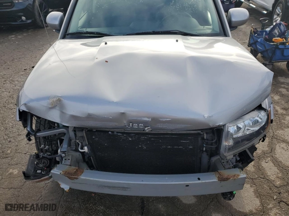 2016 Jeep Compass Latitude with VIN 1C4NJDEB8GD757624, listed as a Copart auction lot 84997714 with 140,906 mi miles and Salvage Title. Bid and sale history available at carsss.com. Image 13.