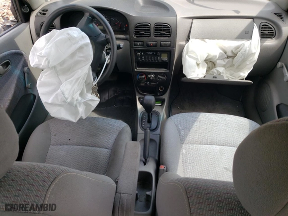 2002 Kia Rio with VIN KNADC123726158130, listed as a Copart auction lot 59104584 with 60,553 mi miles and Salvage Title. Bid and sale history available at carsss.com. Image 8.