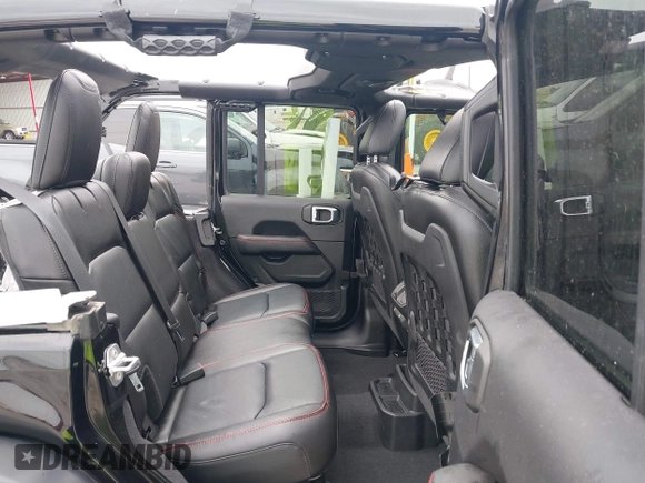 2021 Jeep Wrangler Unlimited Rubicon with VIN 1C4HJXFG7MW662092, listed as a IAAI auction lot 42139521 with 32,055 mi miles and . Bid and sale history available at DreamBid. Image 8.