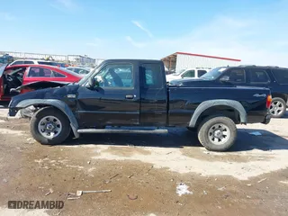2005 Mazda B-Series 4WD Truck SE with VIN 4F4ZR47E35PM03255, listed as a IAAI auction lot 41596707 with 1 mi miles. Bid and sale history available at carsss.com. Image 14.