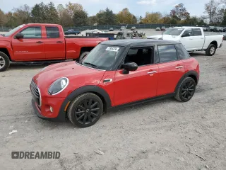 2021 MINI Hardtop 4 Door Oxford Edition with VIN WMWXU7C08M2N49721, listed as a Copart auction lot 77983324 with 64,096 mi miles and Salvage title. Bid and sale history available at DreamBid. Image 1.