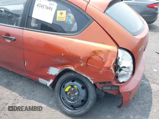 2009 Hyundai Accent GS z VIN KMHCM36C19U115633, wystawiony jako IAAI lot #42417691 z przebiegiem 187 780 mil mil oraz . Historia ofert i sprzedaży dostępna na DreamBid. Obrazek 6.