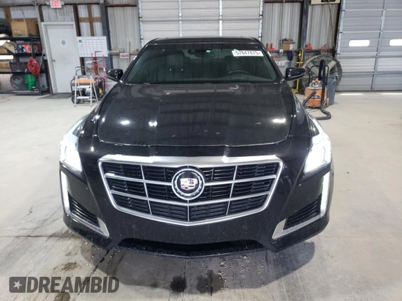 2014 Cadillac CTS Premium AWD с VIN 1G6AZ5S36E0184319, выставлен на аукционе Copart как лот 57847875 с пробегом 86 669 миль миль и Списание • Salvage title. История ставок и продаж доступна на DreamBid. Изображение 5.